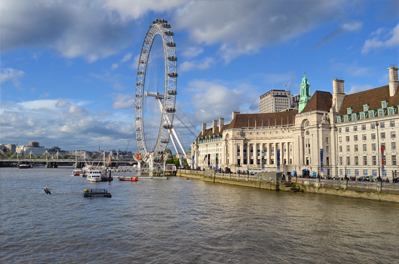 30 - The iconic London Eye observation wheel and County Hall sitting alongside the River Thames in London